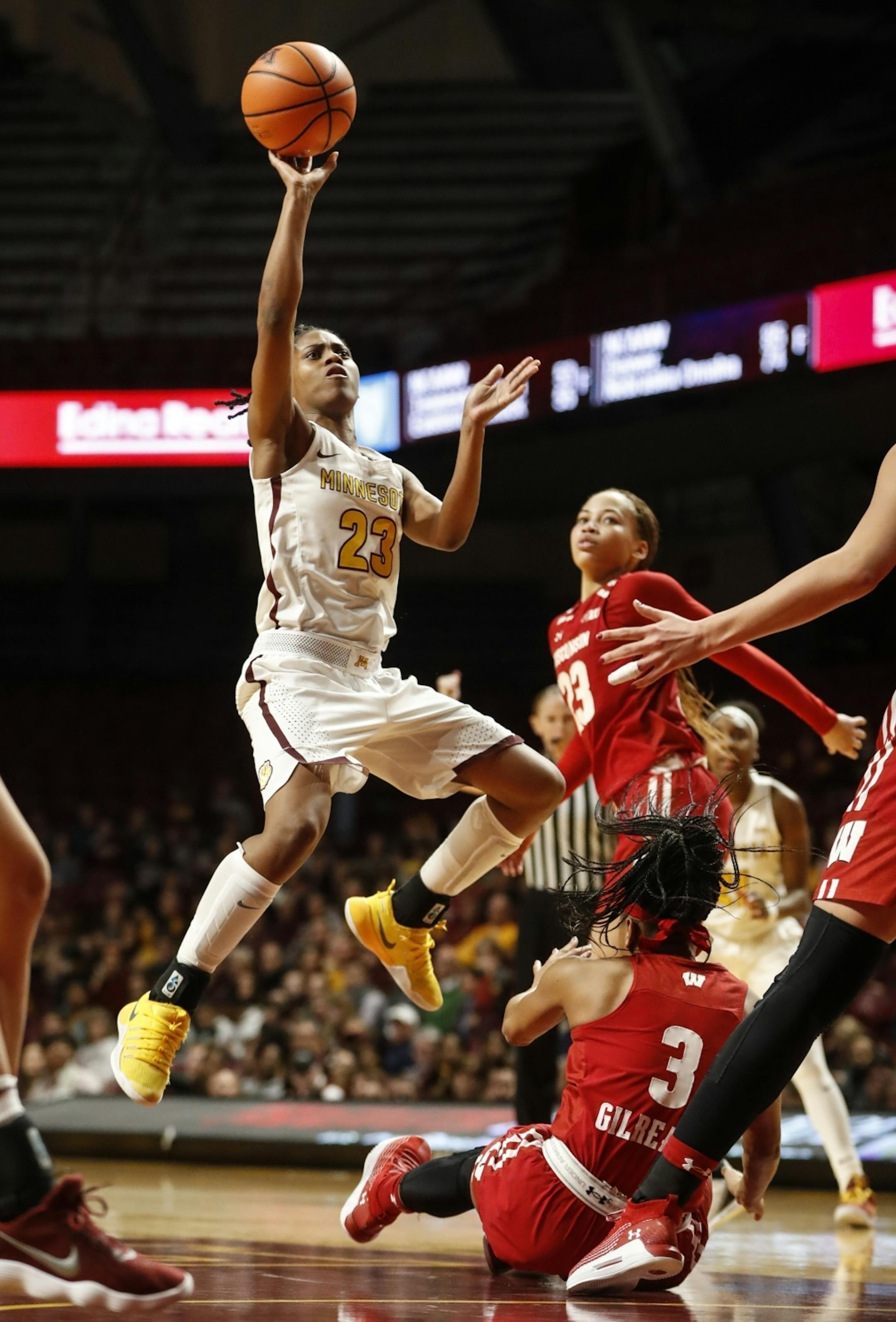 Minnesota Golden Gophers guard Kenisha Bell (23) shot a jump shot in the first half.