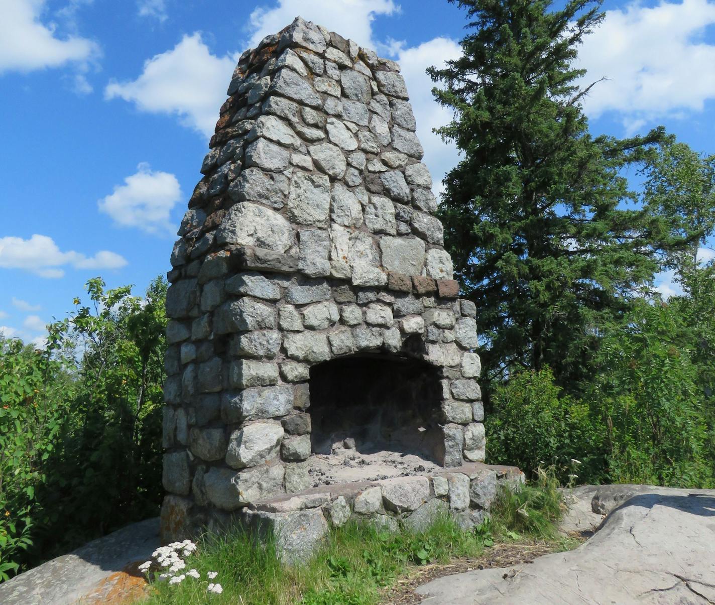 A mysteriously out-of-place fireplace stands alone on Day Hill at Split Rock Lighthouse State Park.