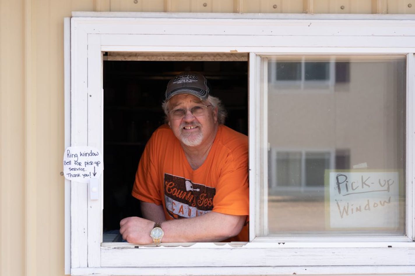 Butch Nicoll, who has run Nicoll's Cafe for 40 years, cried when he had to lay off 13 employees. He said business, which now is operating through a takeout window, is running about 25% of what it was.