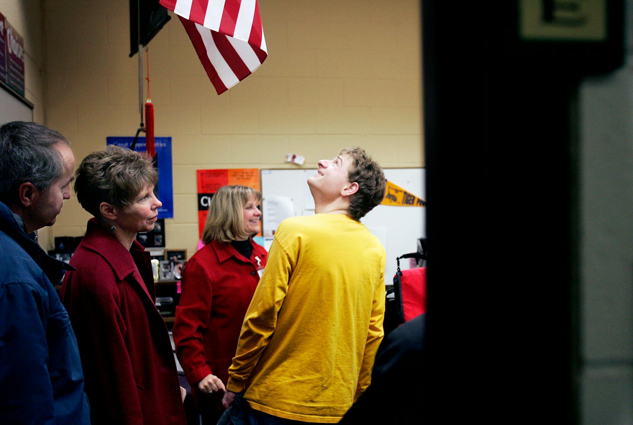 With his parents, Jerry and Barb Kavan, left, Stefan Kavan checked out a classroom during a tour of Dakota County Technical College.