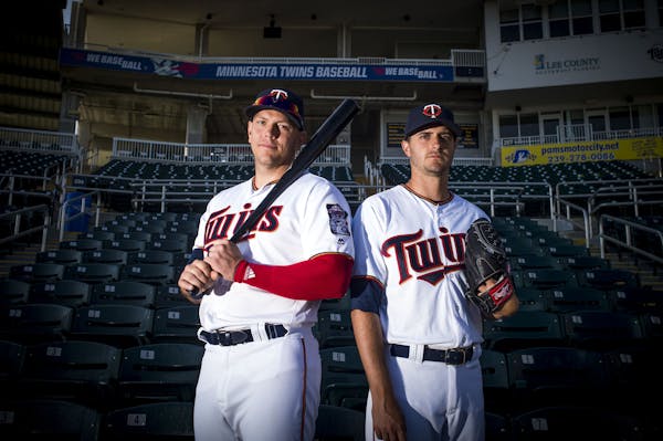 Minnesota Twins players, recently traded from the Tampa Bay Rays, Logan Morrison, left, and Jake Odorizzi, right, pose for a portrait together on Sund