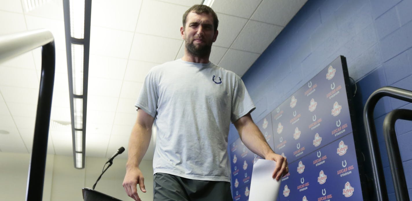 Indianapolis Colts quarterback Andrew Luck leaves the podium after speaking during a news conference following an NFL preseason football game against the Chicago Bears, Saturday, Aug. 24, 2019, in Indianapolis. The oft-injured star is retiring at age 29. (AP Photo/AJ Mast)