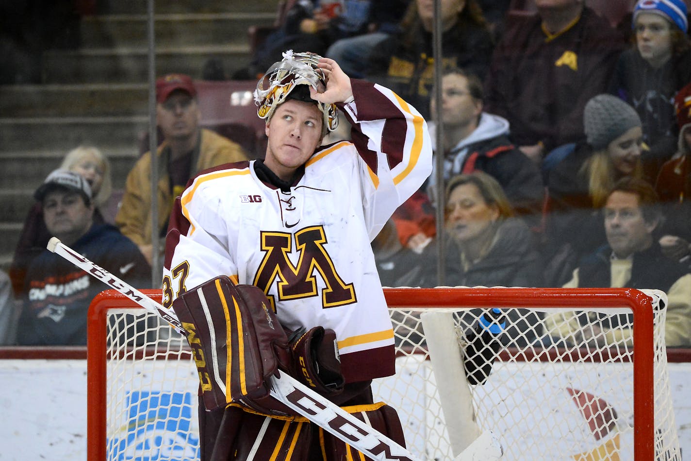 Minnesota Golden Gophers goalie Eric Schierhorn (37) looked up in frustration at the replay board after allowing a tying goal in the second period against the Connecticut Huskies. ] (AARON LAVINSKY/STAR TRIBUNE) aaron.lavinsky@startribune.com The University of Minnesota Golden Gophers men's hockey team played the Connecticut Huskies on Friday, Jan. 1, 2016 at Mariucci Arena in Minneapolis, Minn. ORG XMIT: MIN1601012207193646 ORG XMIT: MIN1603101749210704