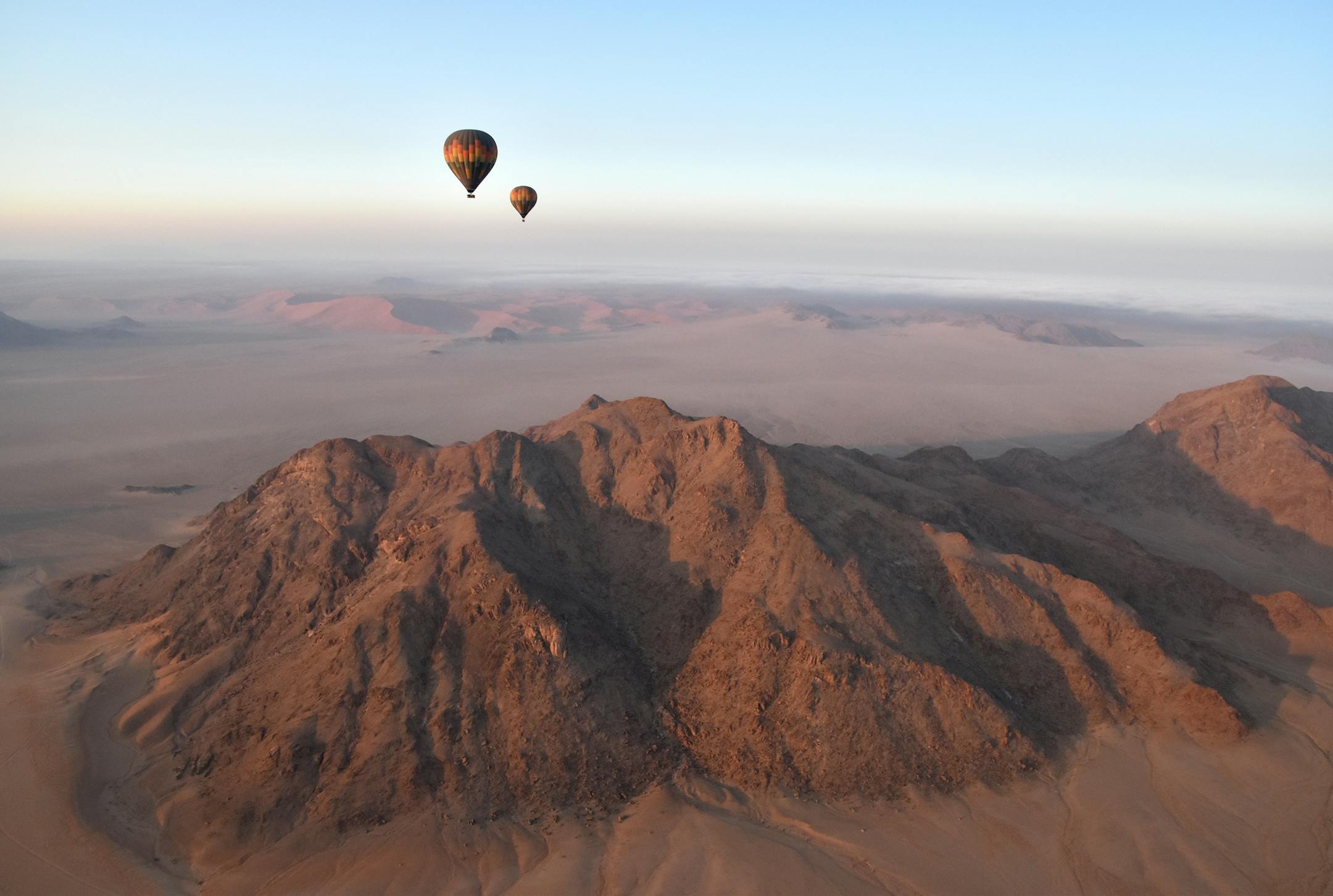 The attached is a photo of my husband and I on a hot air balloon ride on the Kulala Wilderness Reserve in Namibia Africa on September 2017. We took a 2.5 week African safari to Namibia and Botswana in celebration of my birthday. The equipment: A Nikon D5500 with 16-300 lens.
Nancy Weidenfeller <nweidenfeller@mdaleadership.com>
My name is: Nancy Weidenfeller, Minnetonka MN The photo was taken on September 6, 2017 in a hot air balloon ride over the ancient red dunes of the Namib desert in Namibia,