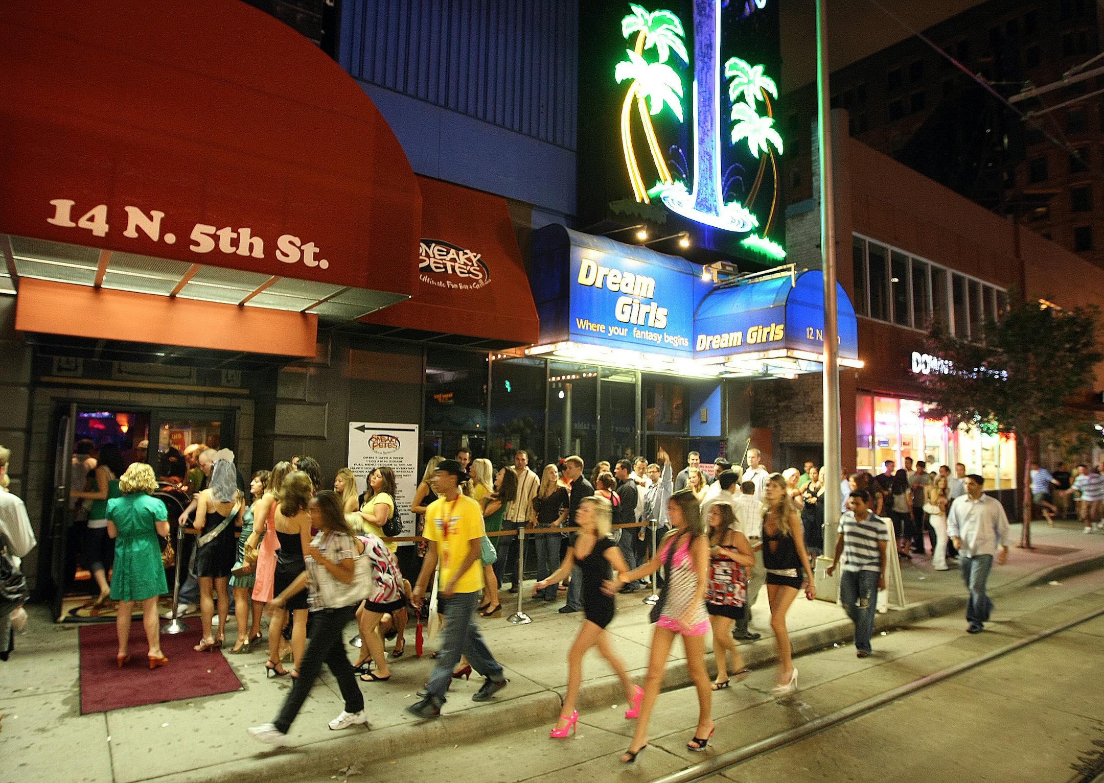 Lining up outside Sneaky Pete's.
