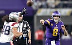 Minnesota Vikings quarterbacks Kirk Cousins (8) attempts a pass in the second quarter Thursday, November 24, 2022, at U.S. Bank Stadium in Minneapolis