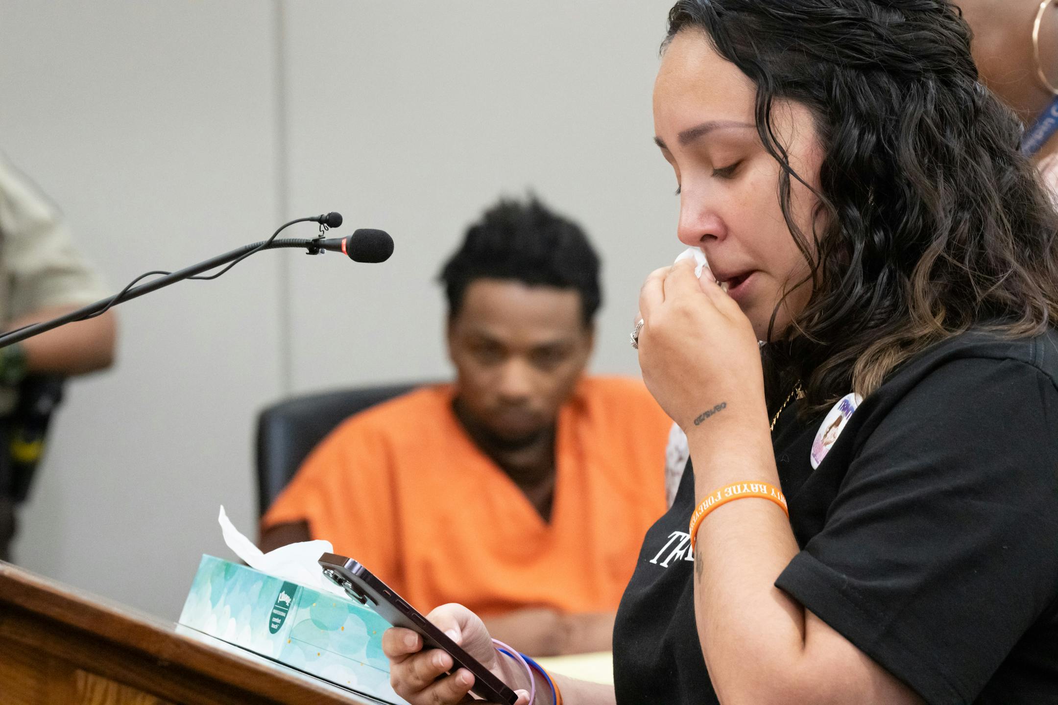 D'Pree Robinson listened as step mother Korrina Smith read letters from Trinity's friends about what her loss means to them.
