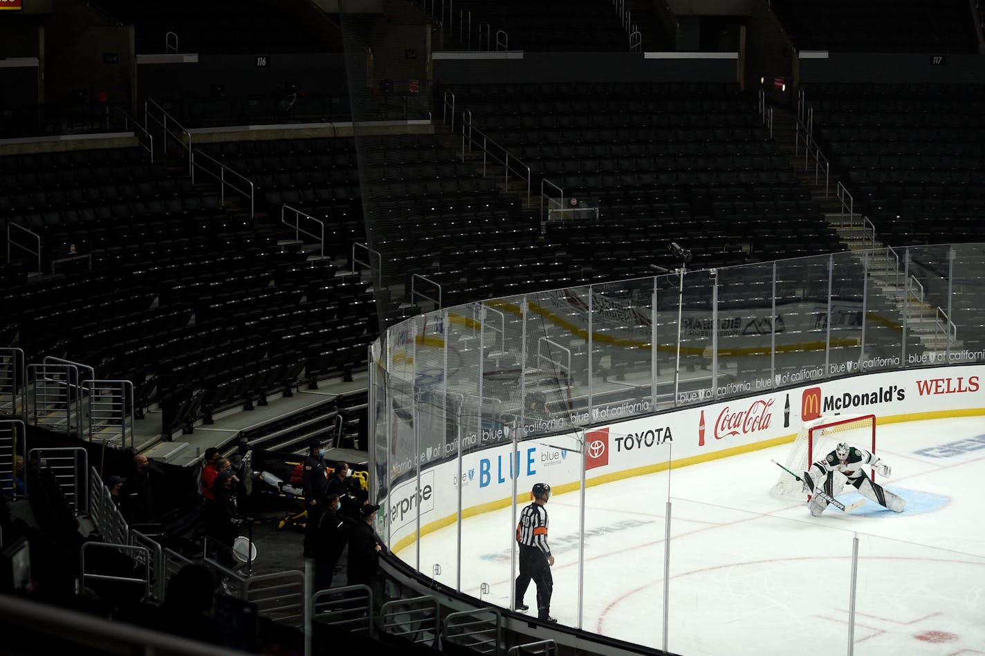 Wild goalie Cam Talbot makes a save during the third period of the team's game against the Los Angeles Kings in an empty Staples Center.