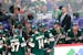 Wild head coach Dean Evason can appear calm on the bench, letting assistants such as Brett McLean, lower left, handle huddles. But if the team scores 