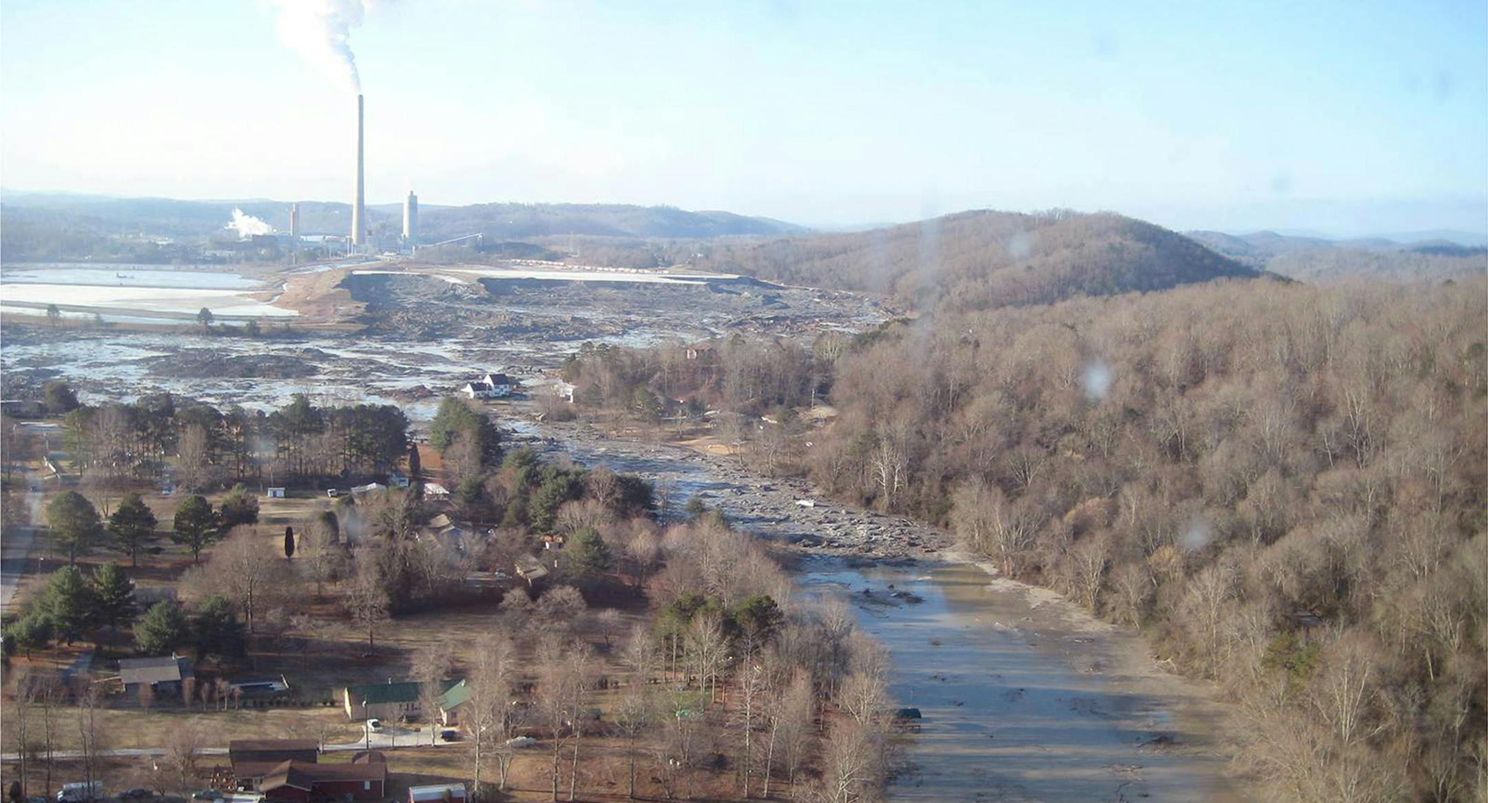 FILE - This file handout photo provided by the Tennessee Valley Authority on Tuesday Jan. 12, 2009 shows the massive ash spill at the Kingston Fossil Plant in Kingston, Tenn., on Dec. 23, 2008, the day following the spill. No one was physically hurt in the Dec. 22, 2008, spill of coal ash from a Tennessee Valley Authority plant storage pond into the Emory River and across some 300 acres in the Swan Pond community about 35 miles west of Knoxville. But property owners in the area say they have bee