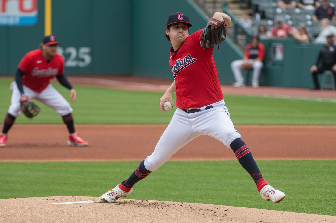 Cleveland Guardians starting pitcher Cal Quantrill delivers against the Minnesota Twins during the first inning of a baseball game in Cleveland Sunday, May 7, 2023. (AP Photo/Phil Long)