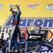 Elliott Sadler celebrates winning the NASCAR Aaron's 312 Nationwide series auto race at Talladega Superspeedway, Saturday, May 3, 2014, in Talladega, 