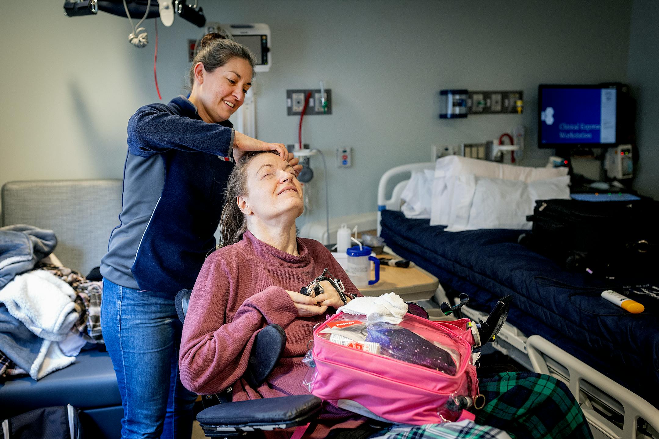 Attorney Misti Okerlund smoothed client Cindy Hagen's hair before Hagen was released from the Mayo Clinic hospital in Austin, Minn.