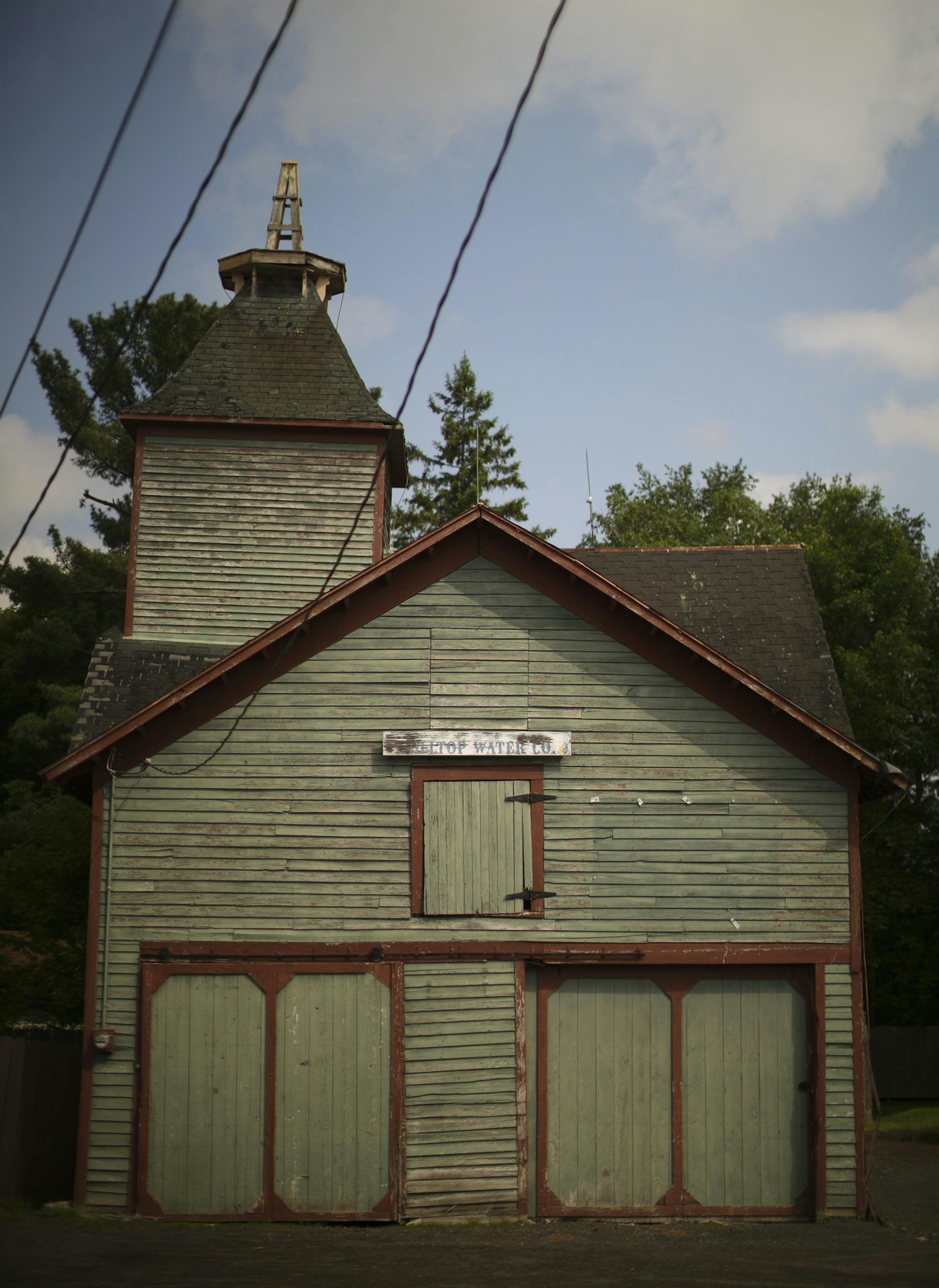 An old barn in "downtown" Scandia is slated for demolition, but some people are trying to save it as a historic centerpiece to this early Swedish community. The city says it's a fire hazard. The barn sits over the well of a water company and evidently once was used to support a water tower. An exterior view of the historic structure in downtown Scandia, Minn. that might be demolished to expand a parking lot. This photograph was made Monday afternoon, June 10, 2013. ] JEFF WHEELER • jeff.w