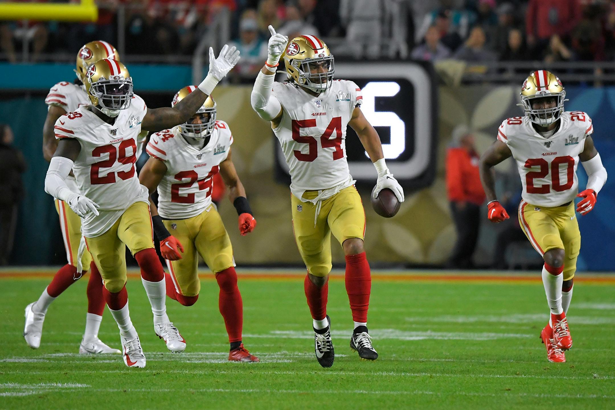 San Francisco 49ers' Fred Warner, center, celebrates his interception against the Kansas City Chiefs during the second half of the NFL Super Bowl 54 football game Sunday, Feb. 2, 2020, in Miami Gardens, Fla.