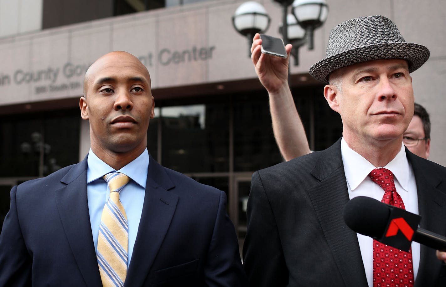 Former Minneapolis police officer Mohamed Noor, left, appeared in Hennepin County District Court with his attorney, Thomas Plunkett but left court without entering a plea to the charges against him in the death of Justine Ruszczyk Damond Tuesday, May 8, 2018, in Minneapolis, MN. ] DAVID JOLES &#xef; david.joles@startribune.com Former Minneapolis police officer Mohamed Noor appeared in Hennepin County District Court