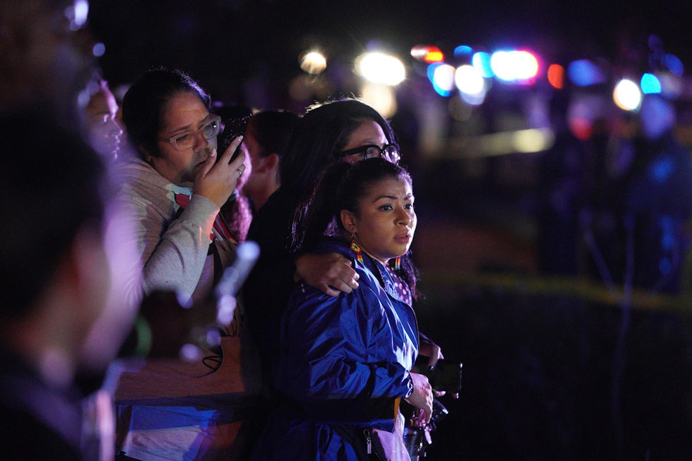 Nearby residents in Richfield watched at the scene of a fatal officer-involved shooting Saturday night by Edina police.