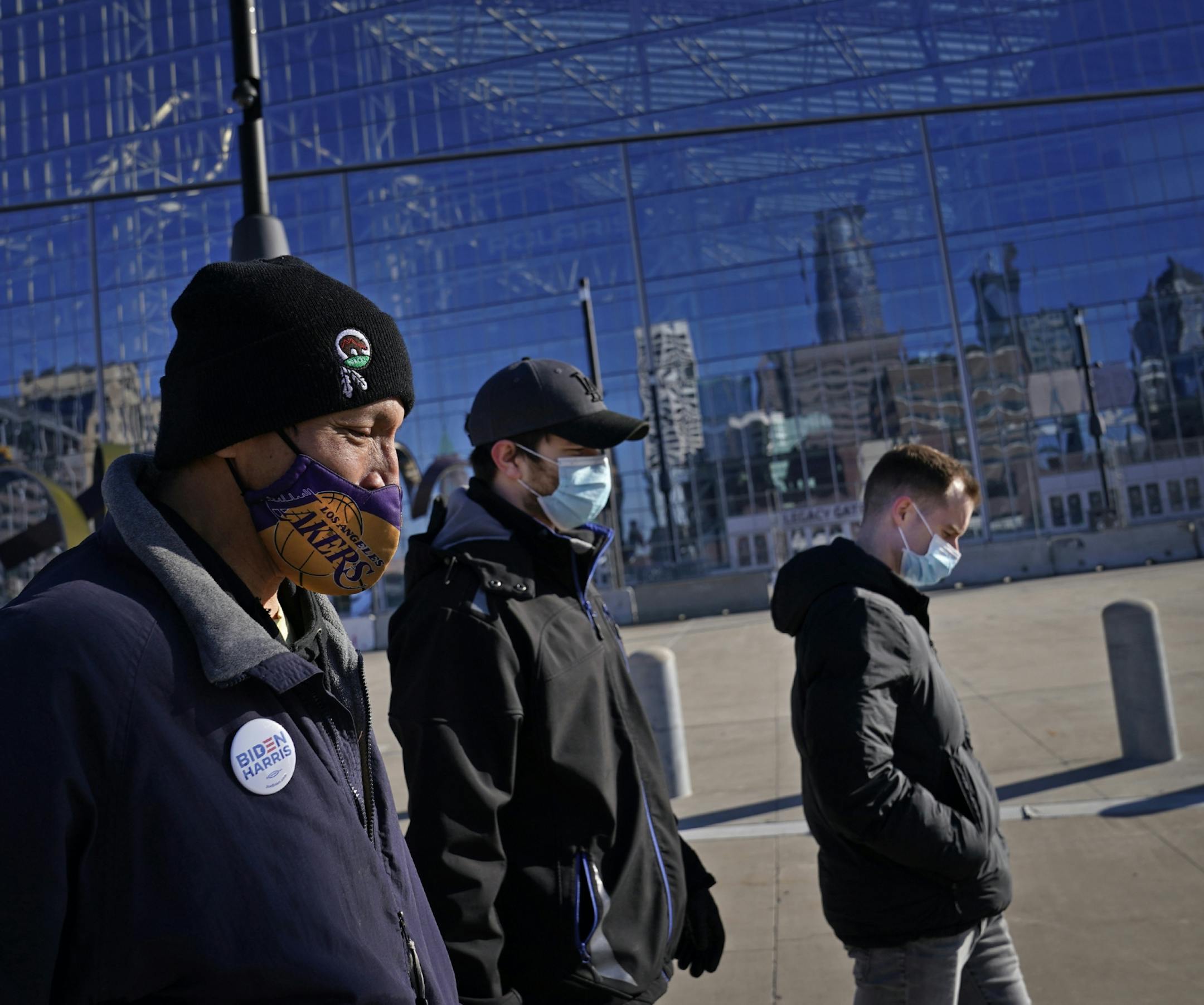 Allen Touche, 48, walked with Nick Mattei, right to left, and Hans Accola, both of whom do outreach ministry and met Touche when he was homeless. They caught up with Touche near the US Bank Stadium metro station, where Touche once slept when homeless. Touche was making his weekly Saturday journey from his current residence in South St. Paul to Minneapolis to help feed homeless Natives and others in Minneapolis.