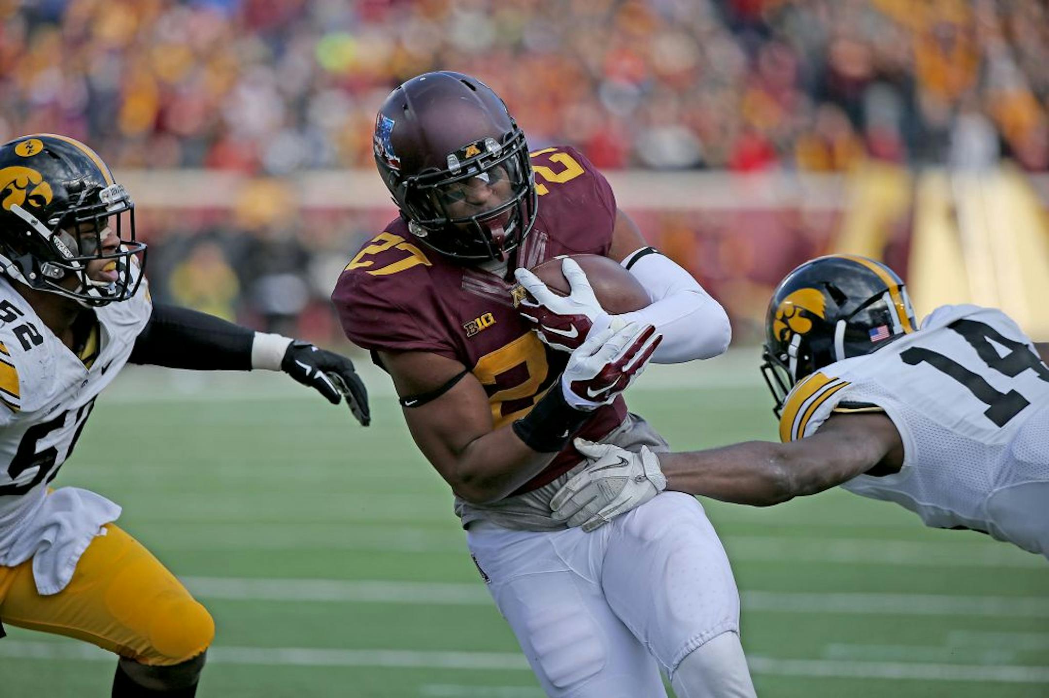 Minnesota's running back David Cobb (27) ran for a 6-yard touchdown in the second quarter as the Gophers took on the Iowa Hawkeyes, Saturday, November 8, 2014 at TCF Stadium in Minneapolis, MN.
