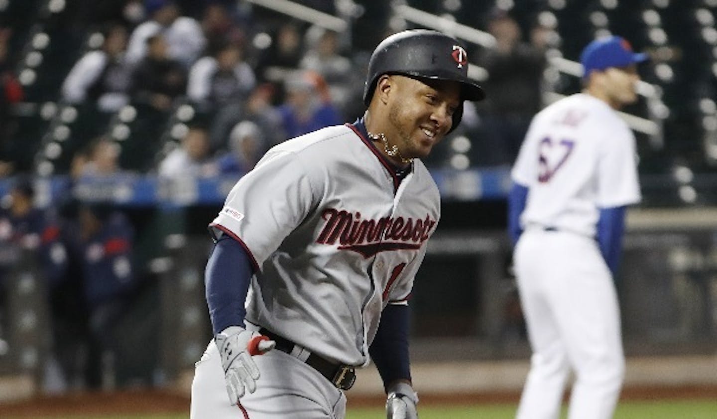 The Twins' Jonathan Schoop rounded the bases after hitting a sixth-inning solo home run -- his first of two homers, and one of six hit by the Twins -- off Mets pitcher Seth Lugo on Tuesday.