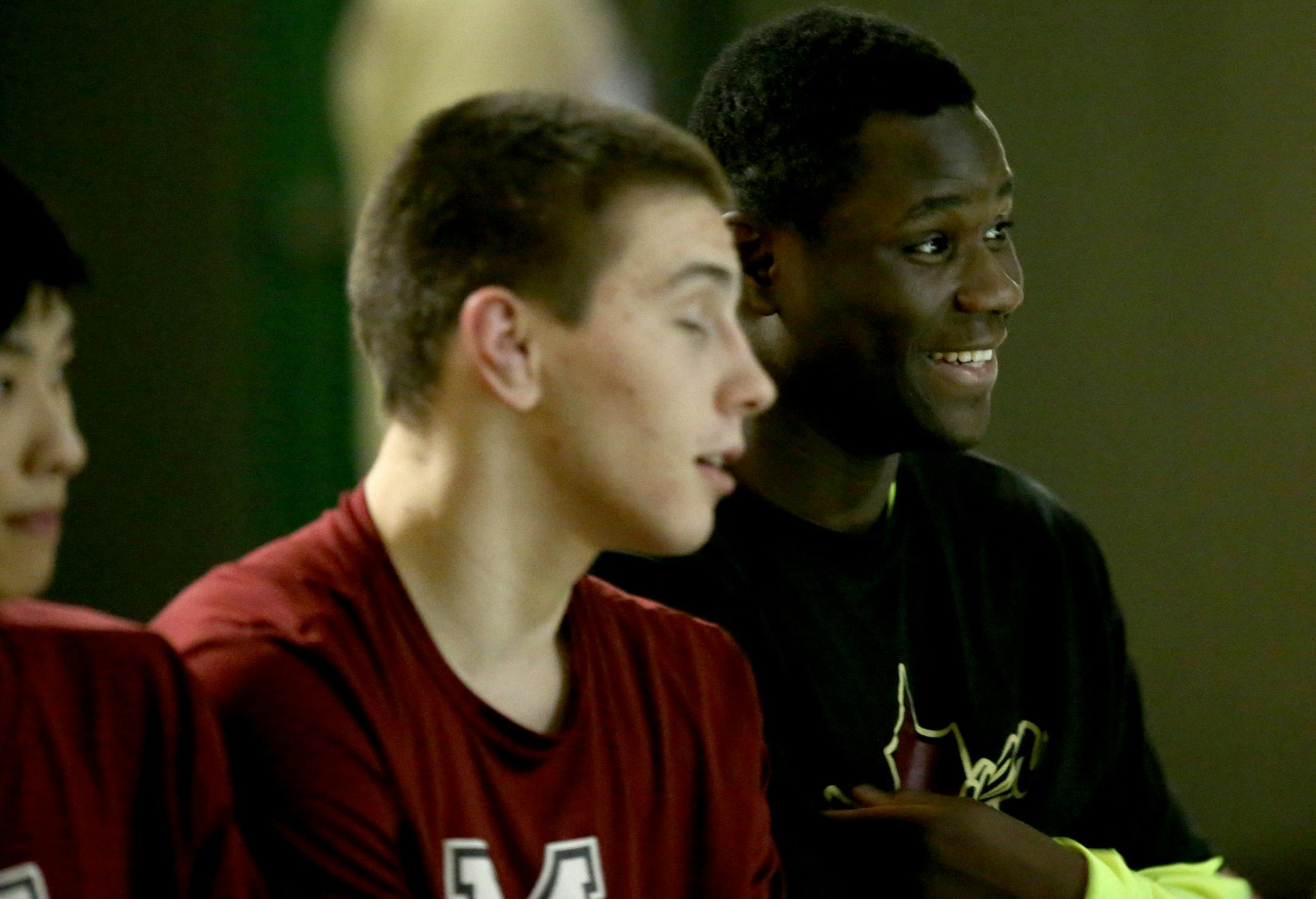 Maple Grove's Jebah Doe, right, talked with teammateLogan Dick during their meet against Park Center. ] (KYNDELL HARKNESS/STAR TRIBUNE) kyndell.harkness@startribune.com Wrestling Maple Grove vs Park Center High School in Brooklyn Park Min., Saturday, January 29, 2015.