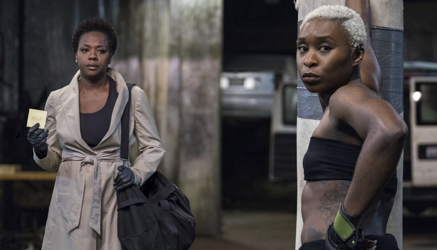 This image released by 20th Century Fox shows Viola Davis, left, and Cynthia Erivo in a scene from "Widows." (Merrick Morton/20th Century Fox via AP)