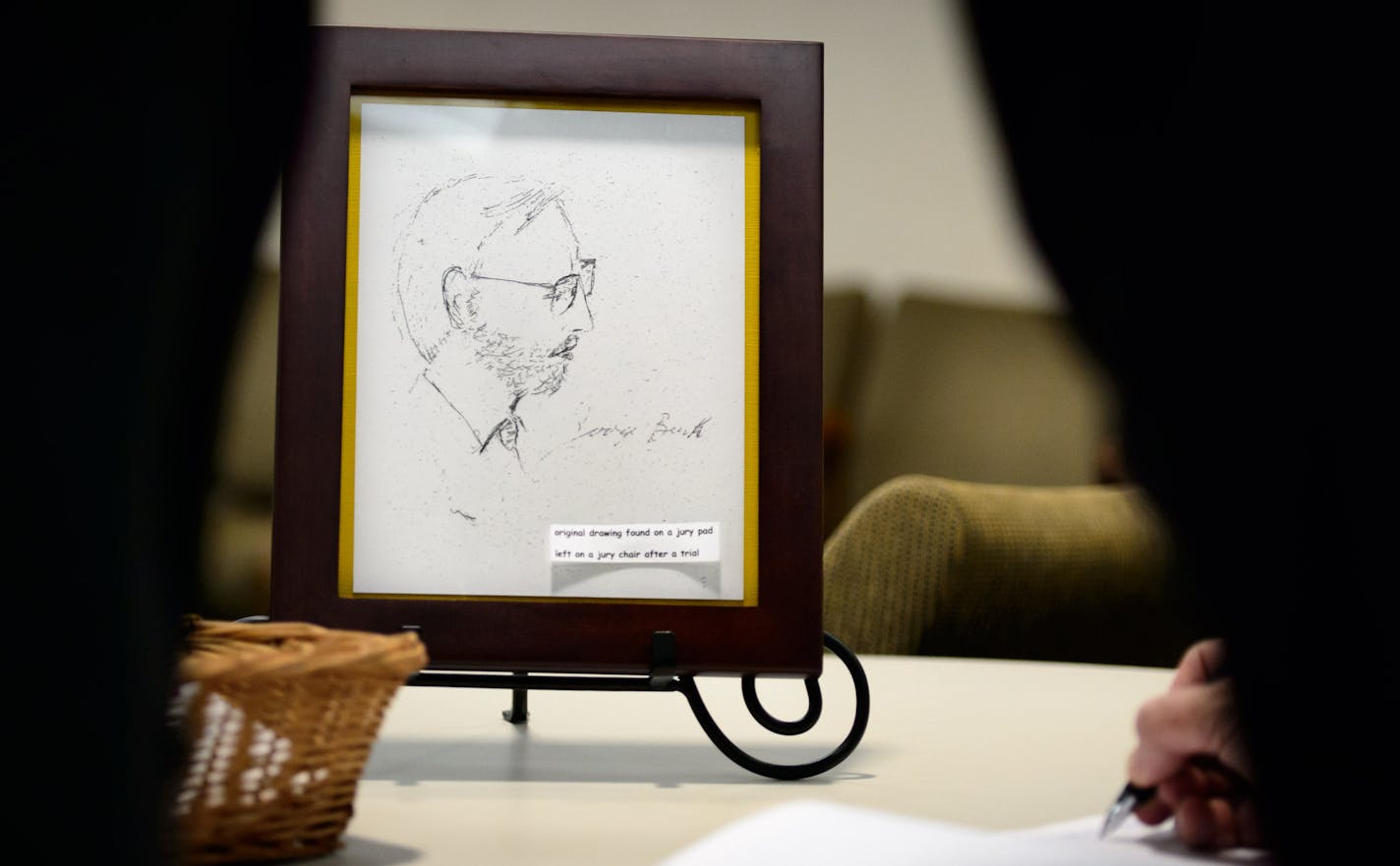 A sketch of Bush that was left behind on a chair by a juror during one of Bush&#x2019;s trials made its way into a frame.