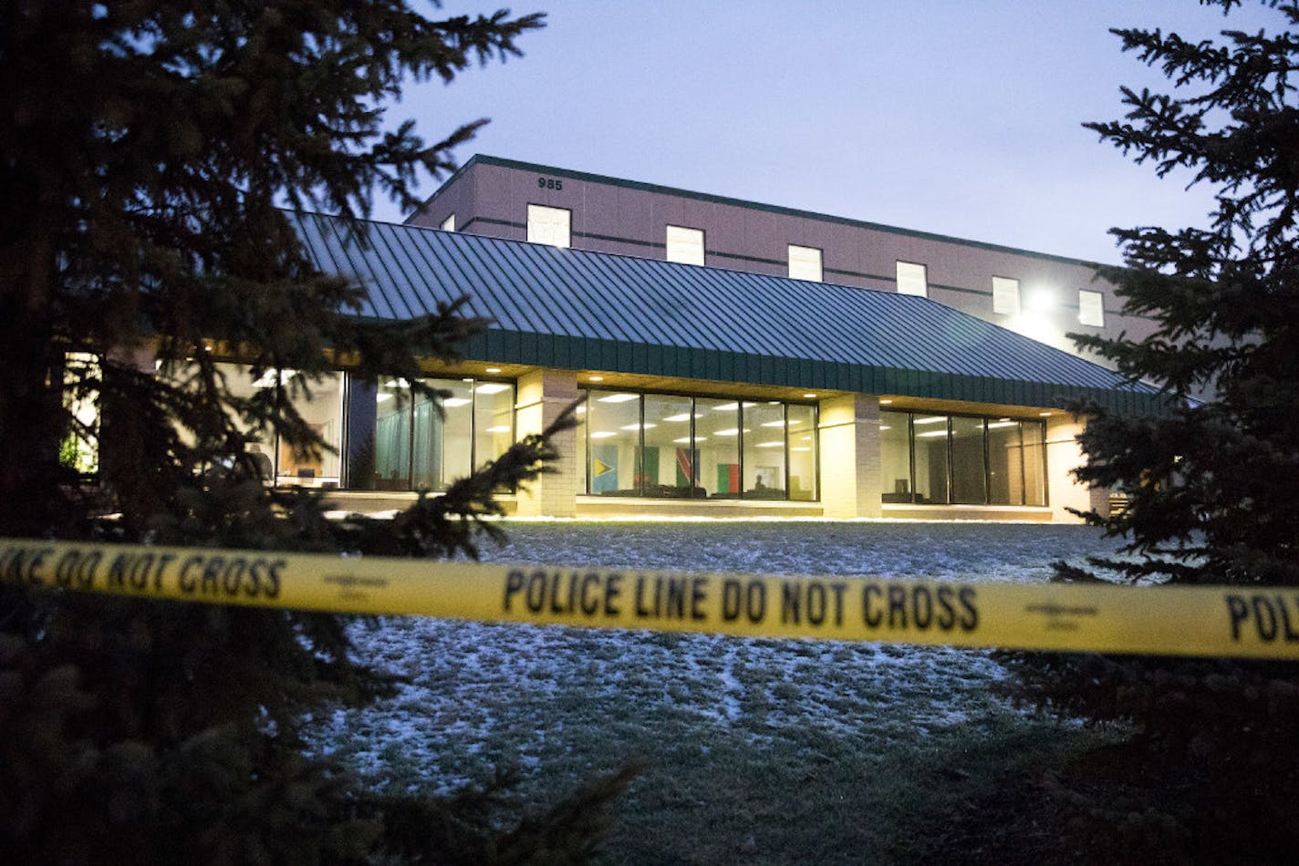 Police tape marks the scene of a shooting in Eagan where a security guard shot and killed a man during an attempted robbery. (Leila Navidi/Star Tribune) leila.navidi@startribune.com