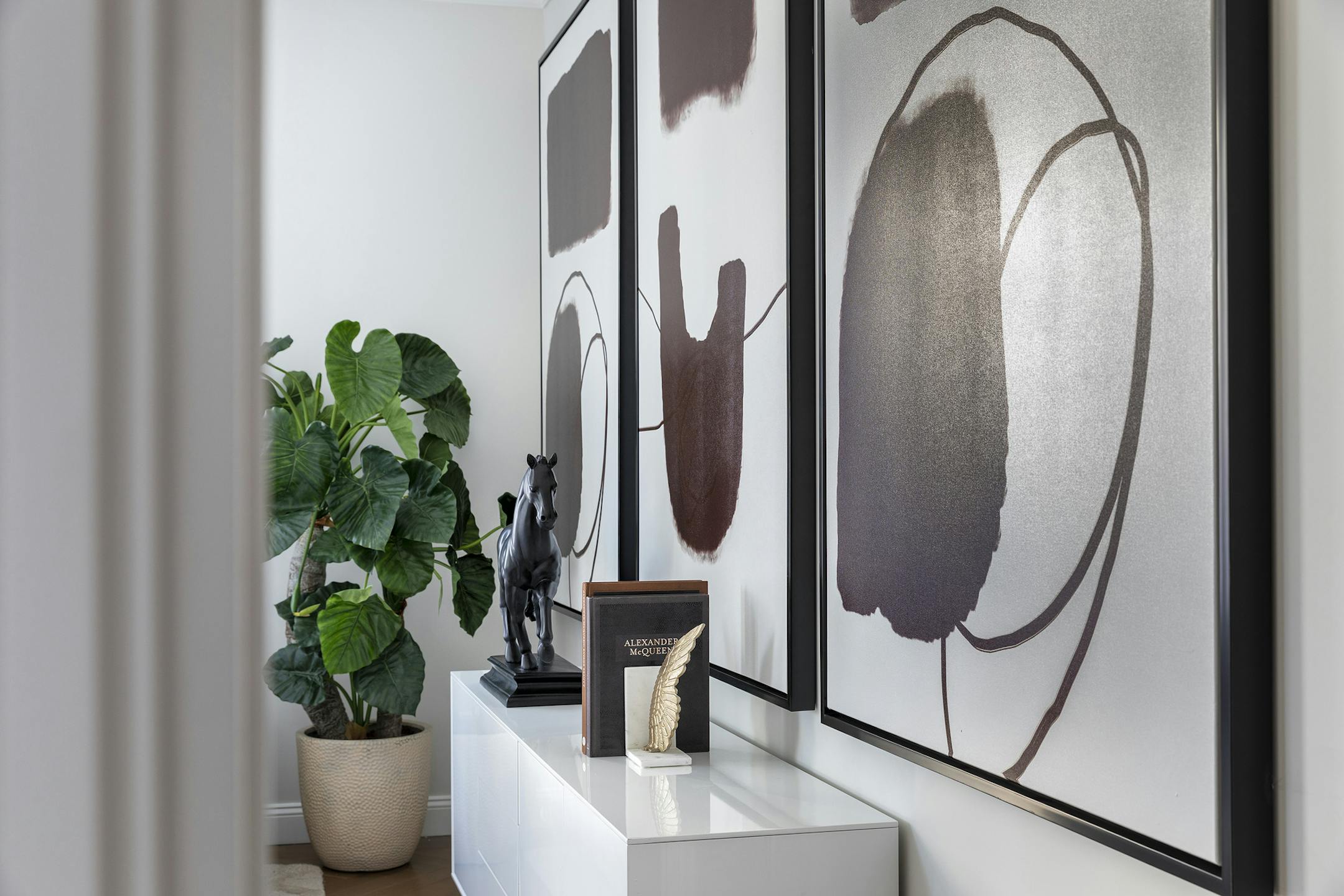 Artwork and other signature pieces can be sourced using many e-design platforms.