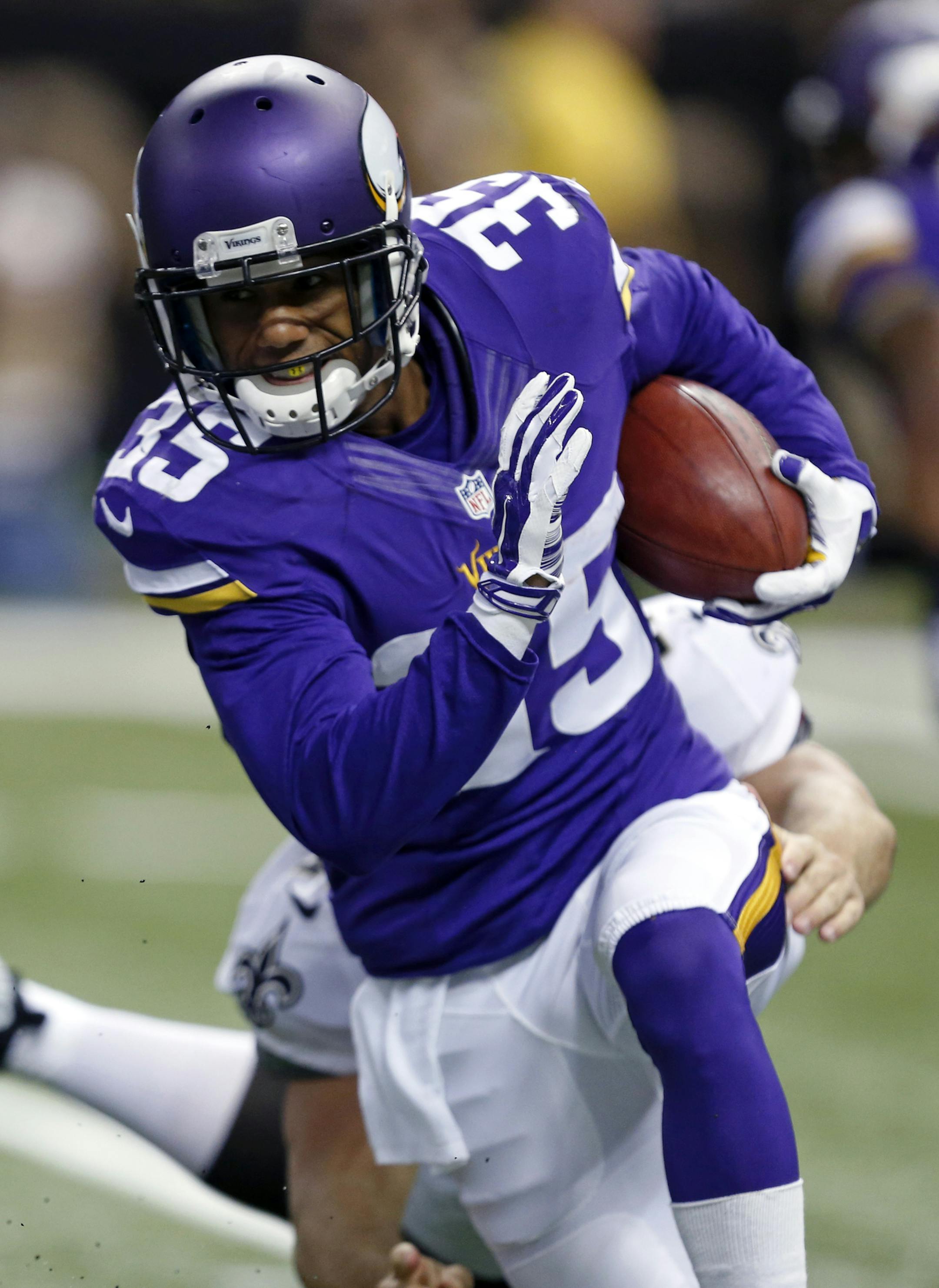 Minnesota Vikings Sherels (35) carries in the first half of an NFL football game against the New Orleans Saints in New Orleans, Sunday, Sept. 21, 2014. (AP Photo/Rogelio Solis)