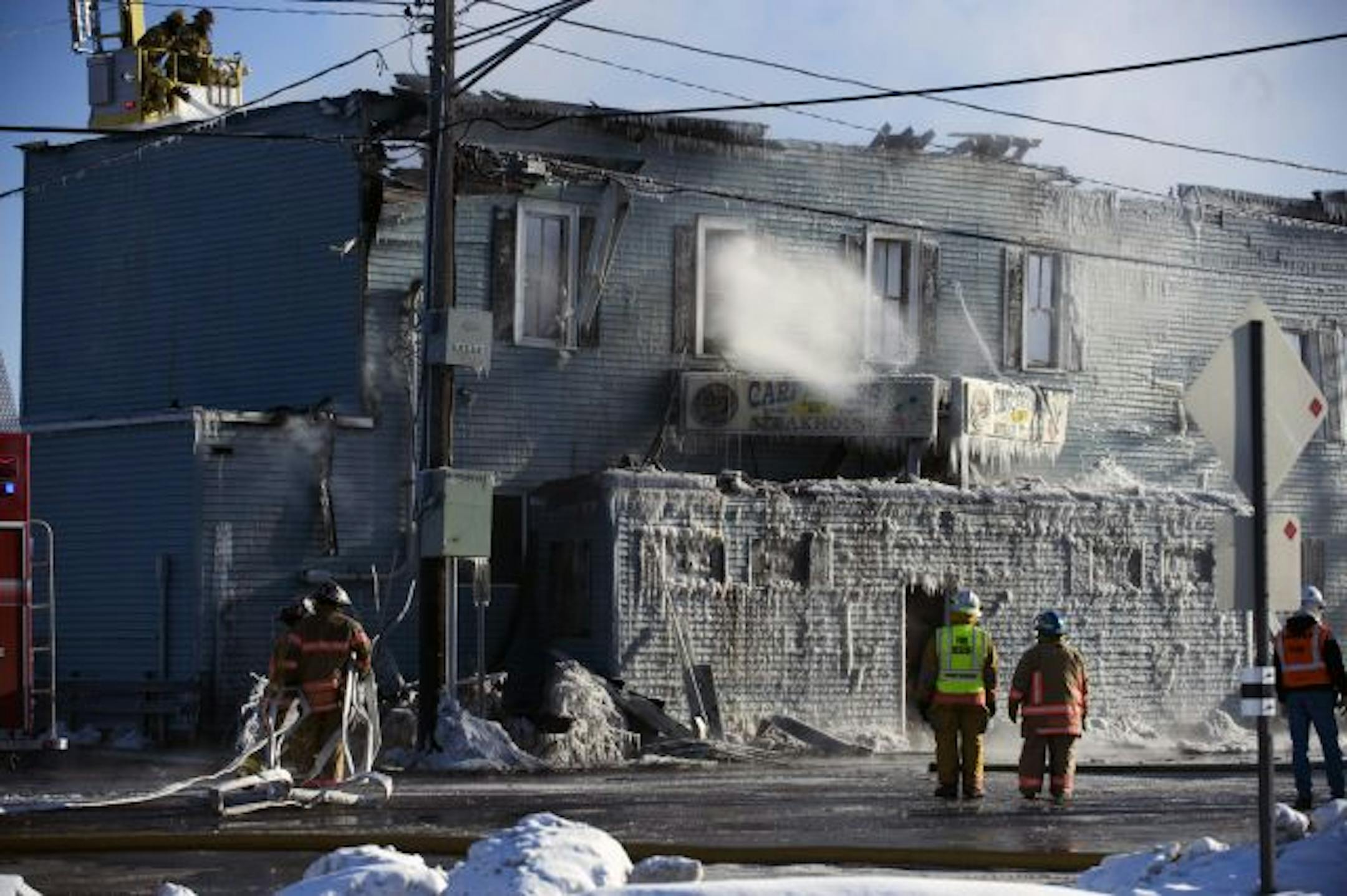Firefighters extinguished the last of the flames at the Hugo landmark on Sunday. "It's been there for so many years and you'd think it would stay forever," said owner Catherine Anderson.