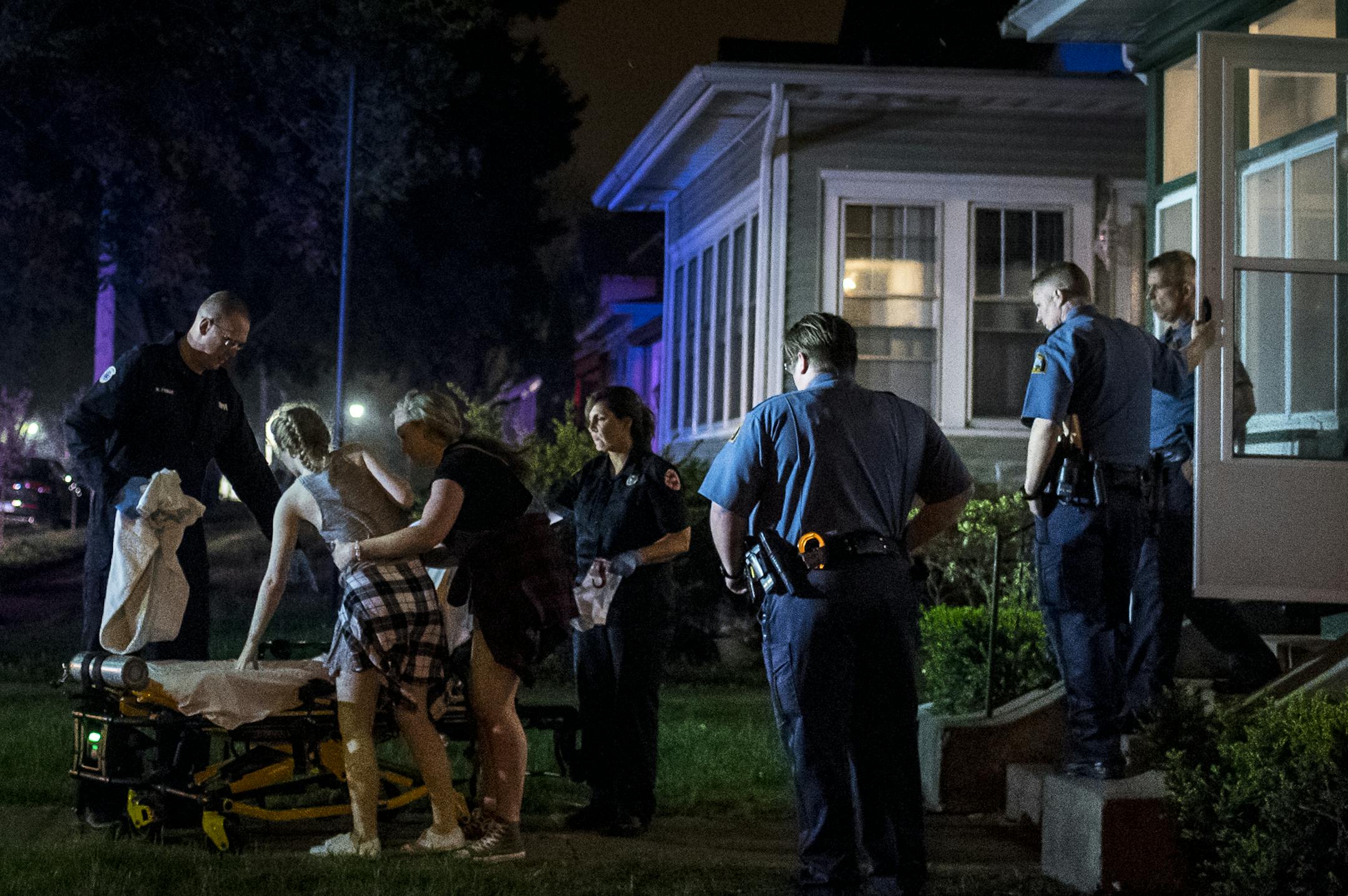 A friend helped an underage and dangerously intoxicated party goer onto a gurney as she was brought to a nearby hospital after a house party the two were attending was broken up by the St. Paul Police due to complaints by neighbors Friday night. ] (AARON LAVINSKY/STAR TRIBUNE) aaron.lavinsky@startribune.com While neighbors of St. Paul's several colleges may feel as if they are facing a hopeless battle against the seemingly invincible forces of college students and off-campus drinking, there is a