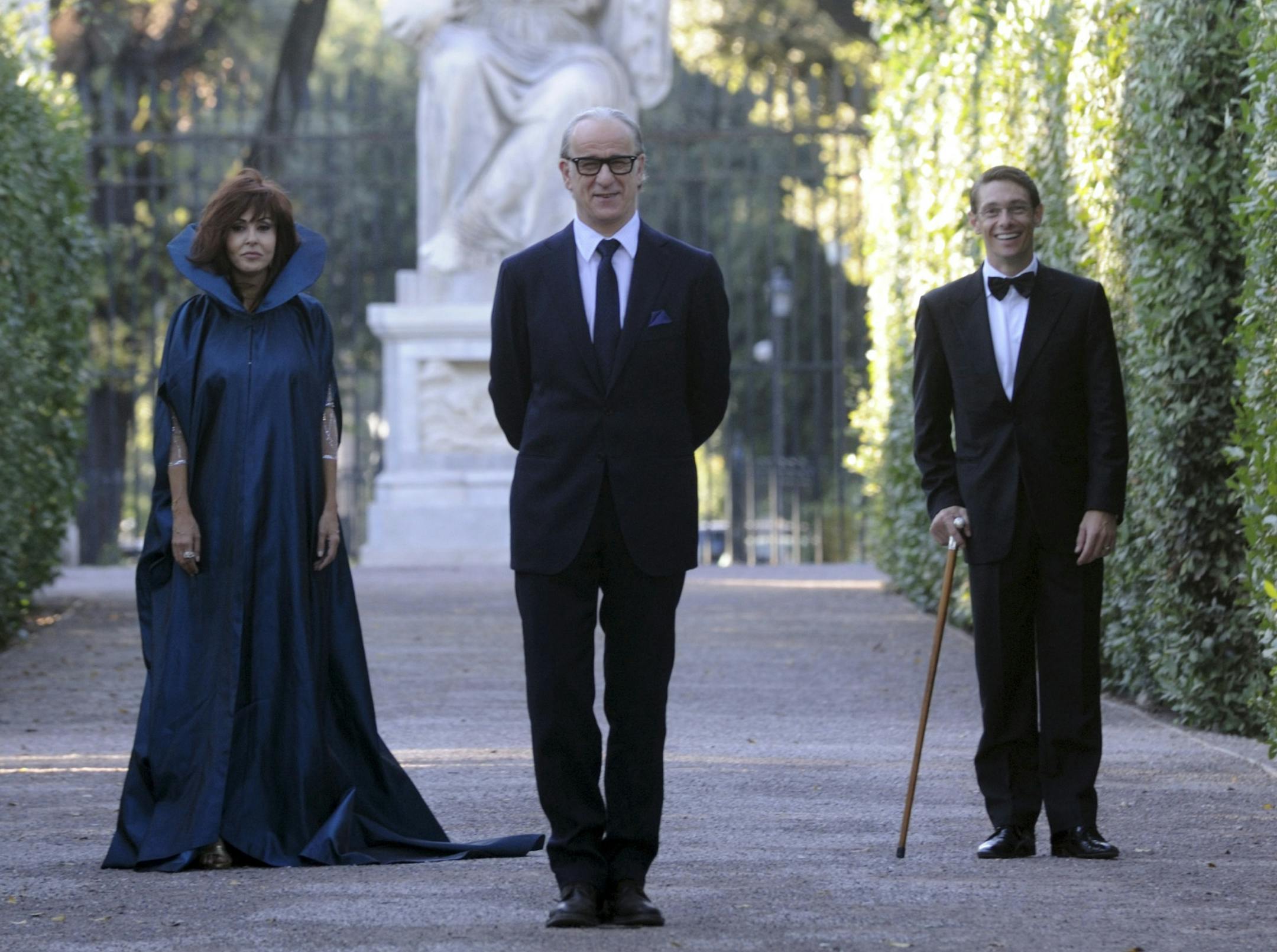 FILE - This undated file photo made available by the press office Punto e Virgola shows, Italian actor Toni Servillo, as Jep Gambardella, center, actress Sabrina Ferilli, as Ramona, left, and actor Giorgio Pasotti, as Stefano, in a scene from Italian director Paolo Sorrentino's "La grande bellezza" (The Great Beauty). The film is nominated for an Academy Award for best foreign picture. The 86th Academy Awards will be held on March 2, 2014, in Los Angeles. (AP Photo/Punto e Virgola Press Office,