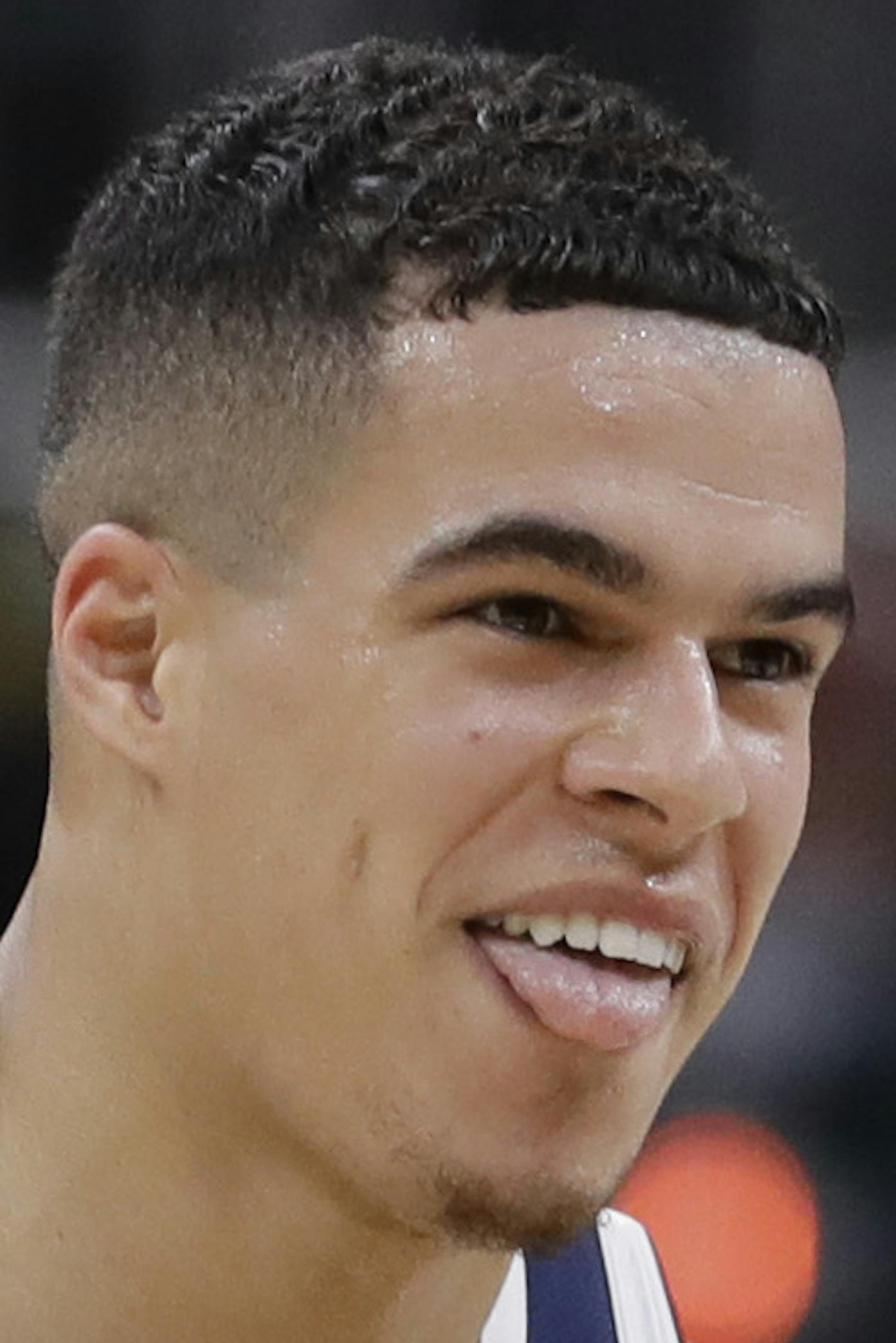 Denver Nuggets' Michael Porter Jr. reacts during the second half of the team's NBA basketball game against the Indiana Pacers, Thursday, Jan. 2, 2020, in Indianapolis. Denver won 124-116. (AP Photo/Darron Cummings)