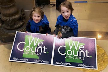 Noelle Fries, left, and Galen Biel, both of Minneapolis, attended a 2019 rally at the Minnesota Capitol to kick off a year-long drive to try to ensure