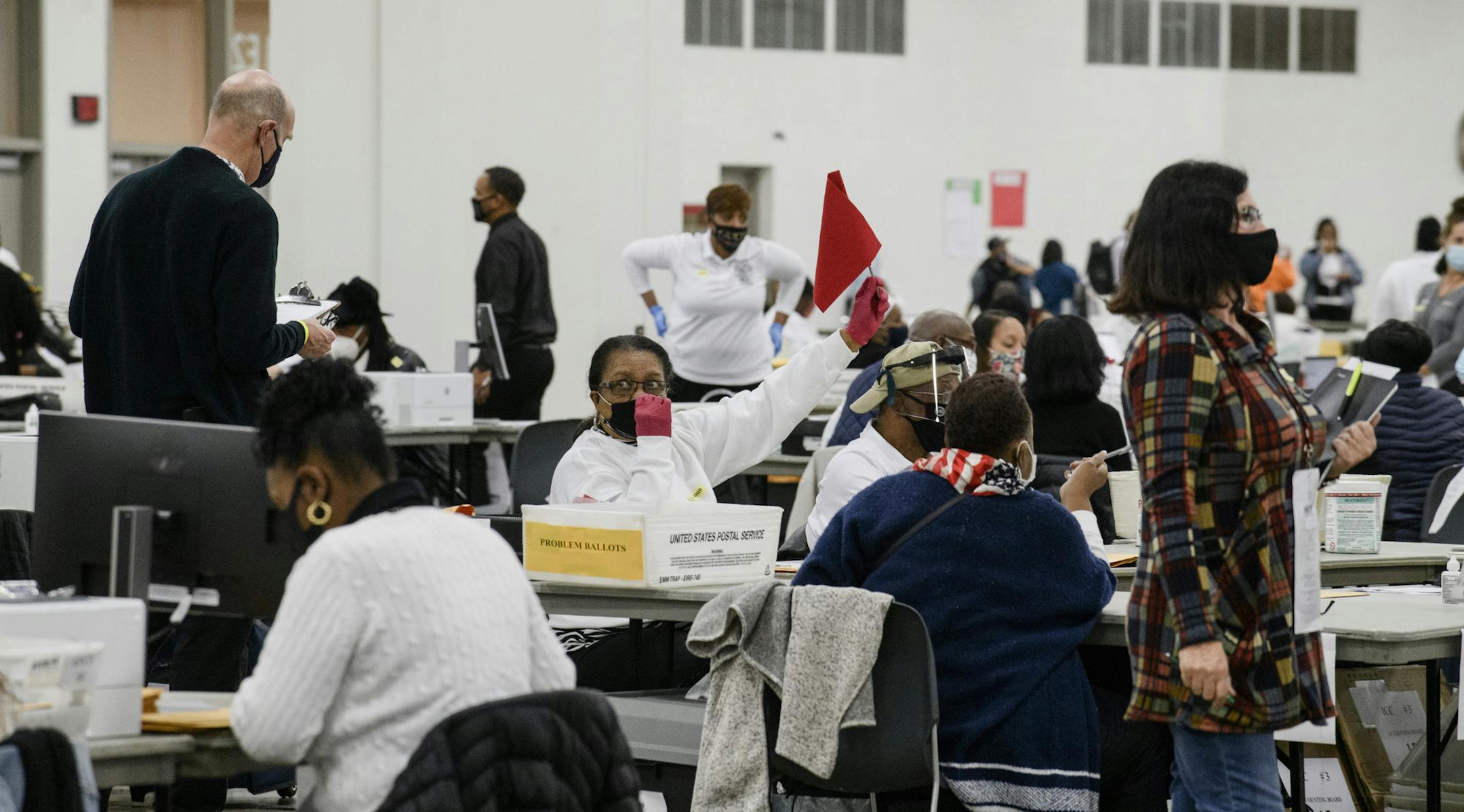 Workers count absentee ballots in Detroit, Nov. 4, 2020. While the nation awaits final results from Pennsylvania, Arizona and other key states, it is already clear Ñ no matter who ends up winning ÑÊthat the industry failed to fully account for the missteps that had led it to underestimate President Donald TrumpÕs support four years ago. (Brittany Greeson/The New York Times)
