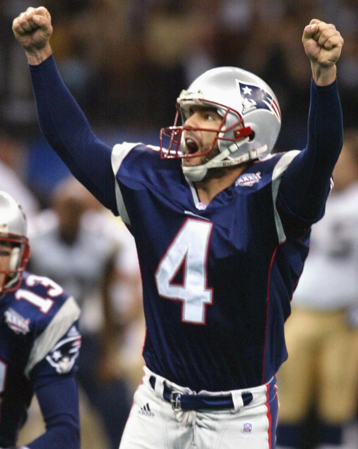 FILE - In this Feb. 3, 2002, file photo, New England Patriots kicker Adam Vinatieri (4) celebrates after kicking a game-winning 48-yard field goal to beat the St. Louis Rams 20-17 in NFL football's Super Bowl XXXVI in New Orleans. (AP Photo/Doug Mills, File)