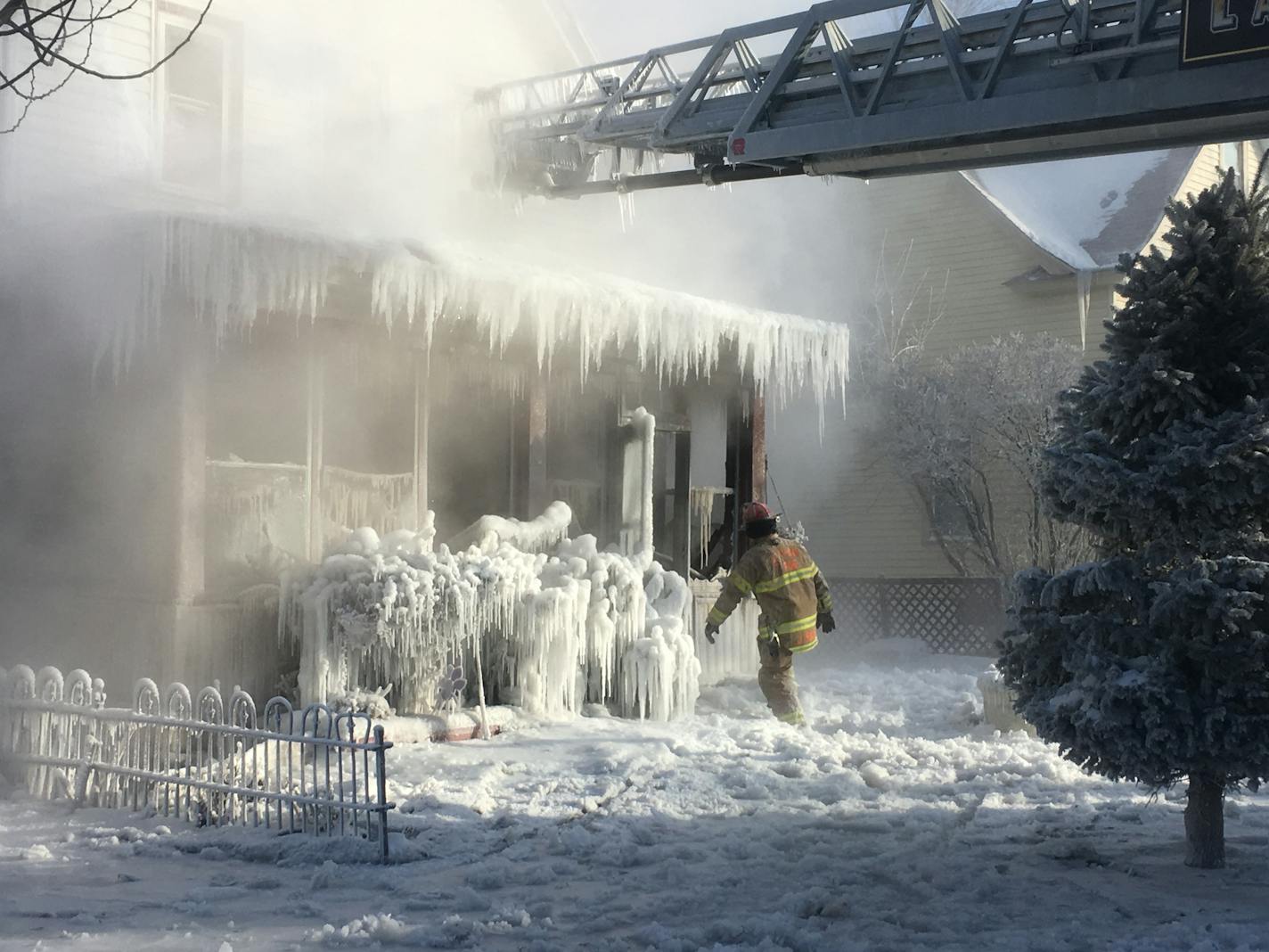 Firefighters in St. Paul endured wind chills around -50 degrees early Wednesday morning as they battled a house fire at a home on Hatch Av. east.