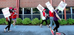 Nurses on strike made their way around Abbott Northwestern Hospital Monday, September 5, 2016 in Minneapolis, MN. They joined hundreds of nurses durin