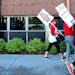 Nurses on strike made their way around Abbott Northwestern Hospital Monday, September 5, 2016 in Minneapolis, MN. They joined hundreds of nurses durin