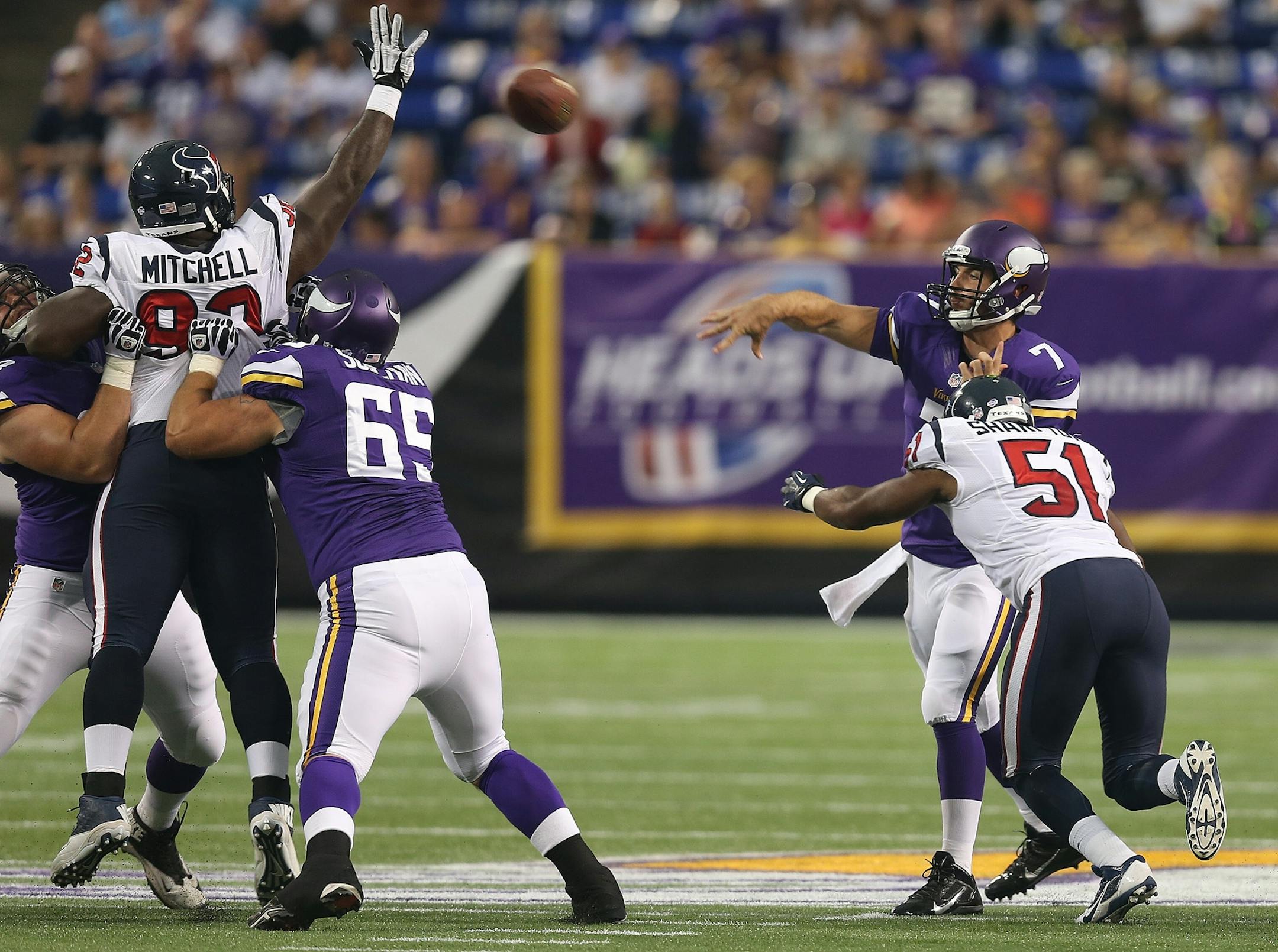 Christian Ponder throws an interception against the Houston Texans in a preseason game at Mall of America Field, Friday, August 9, 2013