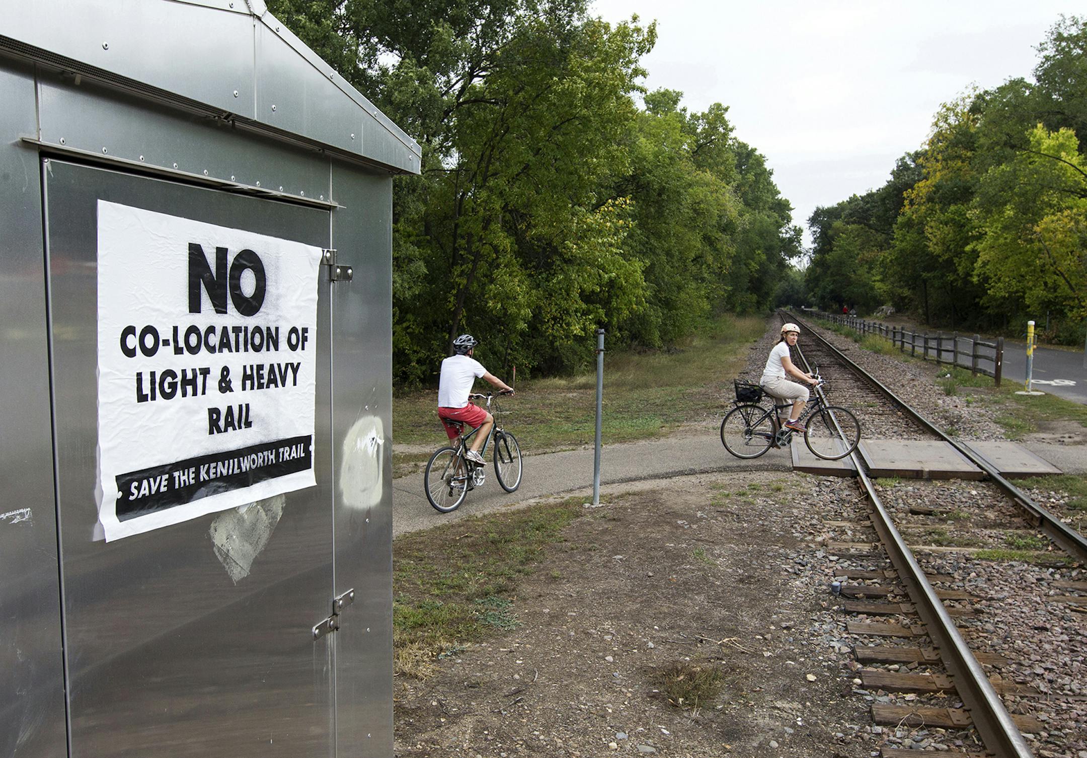 Sept. 27, 2013: A sign on Kenilworth Trail and Cedar Lake Parkway speaks against co-location of light and heavy rail in Minneapolis.