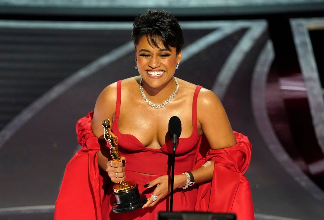 Ariana DeBose became the first Afro-Latina and first openly queer woman of color to get an acting Oscar Sunday. “To anybody who has questioned your identity, there is indeed a place for us,” she said on accepting the supporting actress award. 