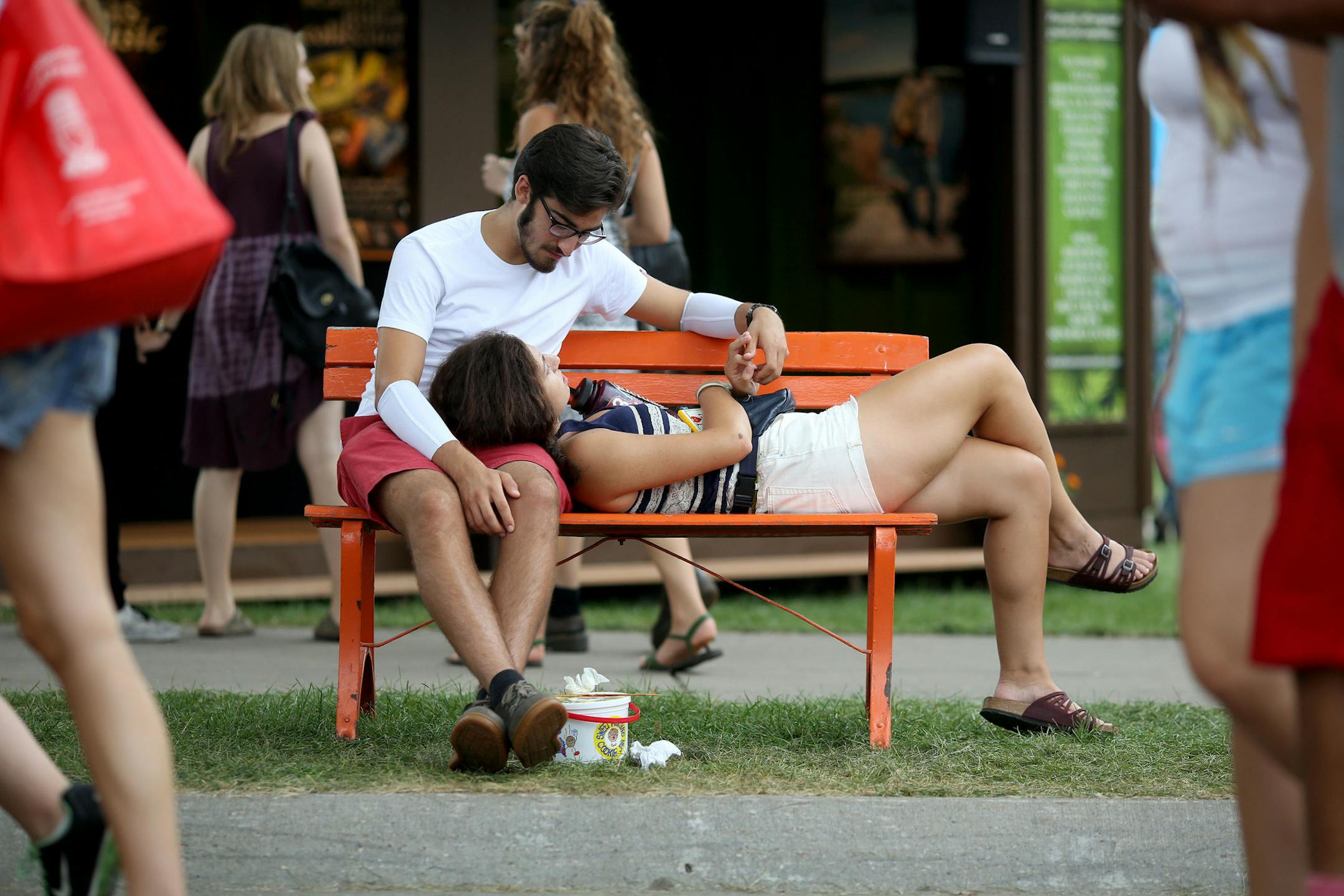 Grace Jurkovich, 18, of St. Paul, laid in the lap of Sam Wegner, 17, of Minneapolis at the Fair ] (KYNDELL HARKNESS/STAR TRIBUNE) kyndell.harkness@startribune.com Minnesota State Fair in Falcon Heights Min., Friday, August, 22, 2014.