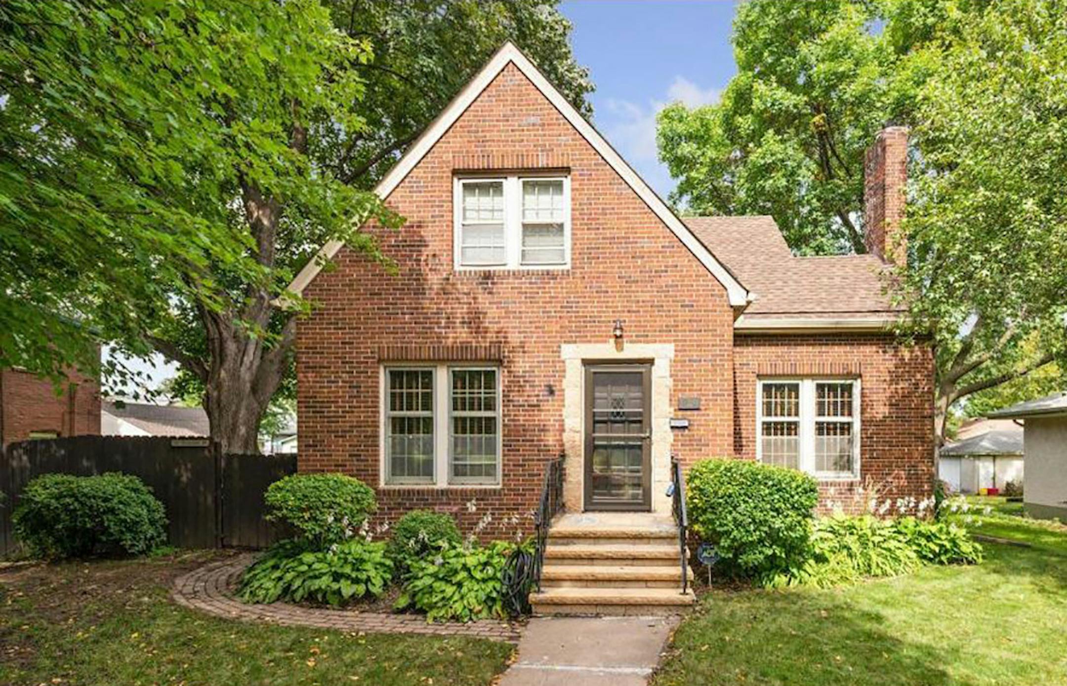 St. Paul
Built in 1941, this four-bedroom, two-bath house located in the Payne-Phalen neighborhood has 1,881 square feet and features an all-brick exterior, two bedrooms with a full kitchen and full bath on the upper and main levels, two fireplaces, hardwood floors, full partially-finished basement, deck, patio, fenced yard and two-car detached brick garage. Listed by Bill Duel, Coldwell Banker Burnet, 612-247-8386.