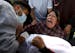 Mourners attend a funeral for a Palestinian killed in an Israeli airstrike in Khan Yunis, Gaza, on Oct. 10.