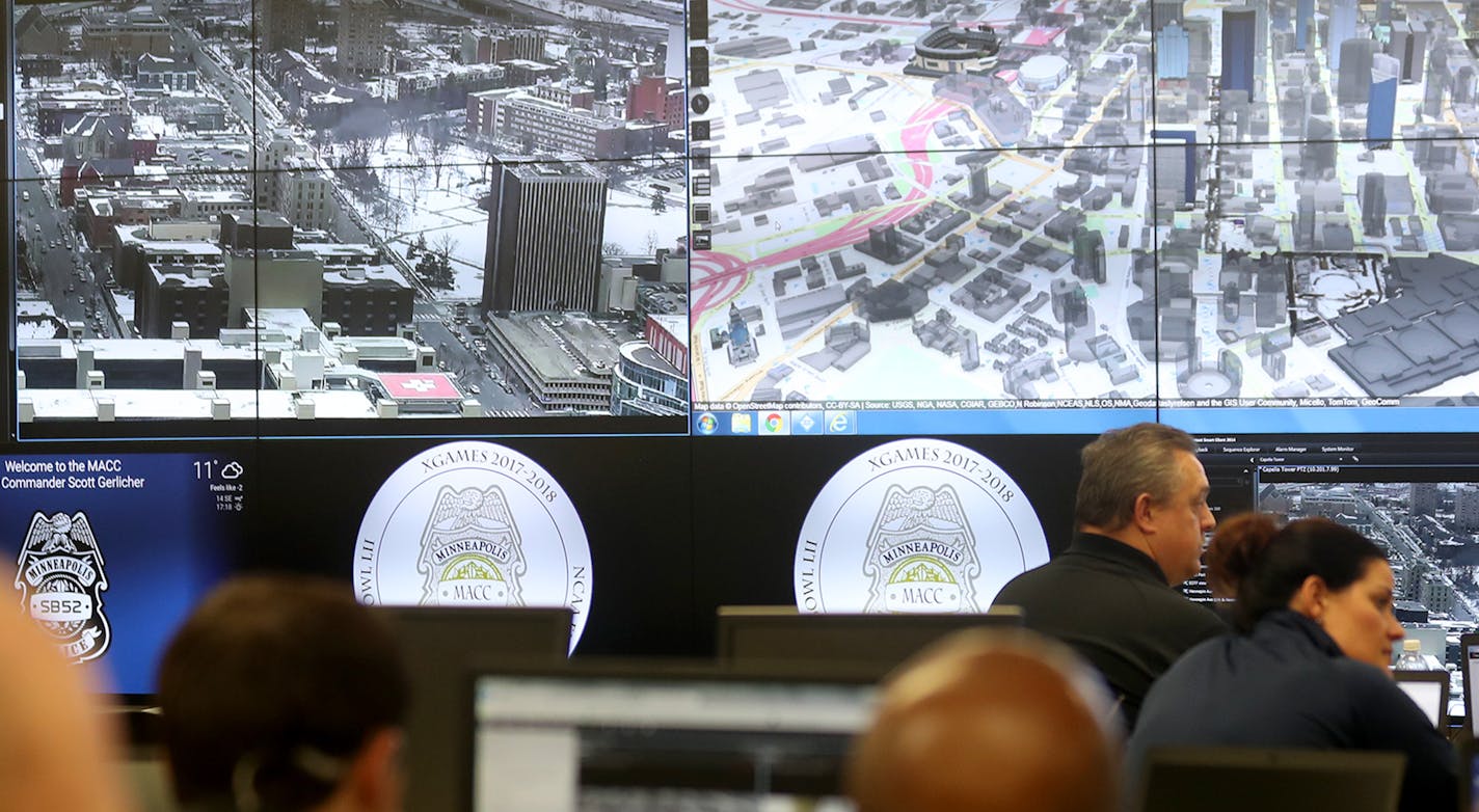 The Multi-Agency Command Center (MACC) sits in a secret location near US Bank Stadium and houses local, state and federal law enforcement agencies with about 80 folks in the room. A giant video bank allows for live video monitoring of various areas in and around the Super Bowl as well as various locations in downtown as was seen Wednesday, Jan. 30, 2018, in Minneapolis, MN.] DAVID JOLES &#xef; david.joles@startribune.com