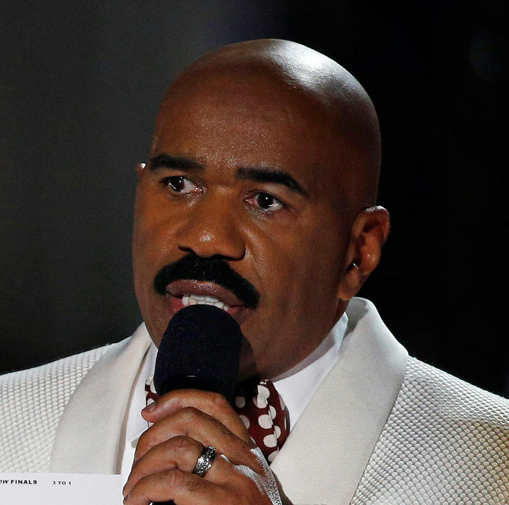 Steve Harvey holds up the card showing the winners after he incorrectly announced Miss Colombia Ariadna Gutierrez as the winner at the Miss Universe pageant on Sunday, Dec. 20, 2015, in Las Vegas. Miss Philippines Pia Alonzo Wurtzbach was named Miss Universe. (AP Photo/John Locher)