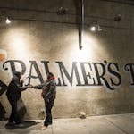 Two Palmer's Bar patrons, who go by the names "R.D." and "C," shook hands before parting ways outside the bar Saturday night. ] (AARON LAVINSKY/STAR T