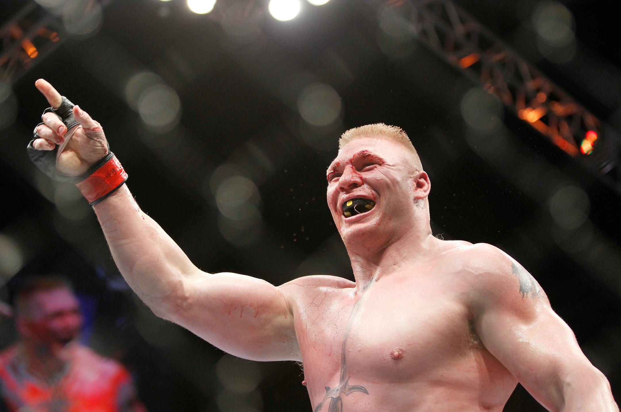 Brock Lesnar celebrated his second-round victory over Shane Carwin during UFC 116 in Las Vegas.